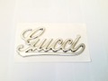 Malý znak Gucci